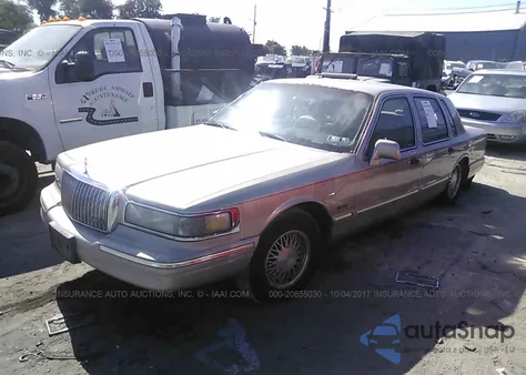 1997 Lincoln Town Car Signature из США, поврежденный, VIN 1LNLM82W0VY757857